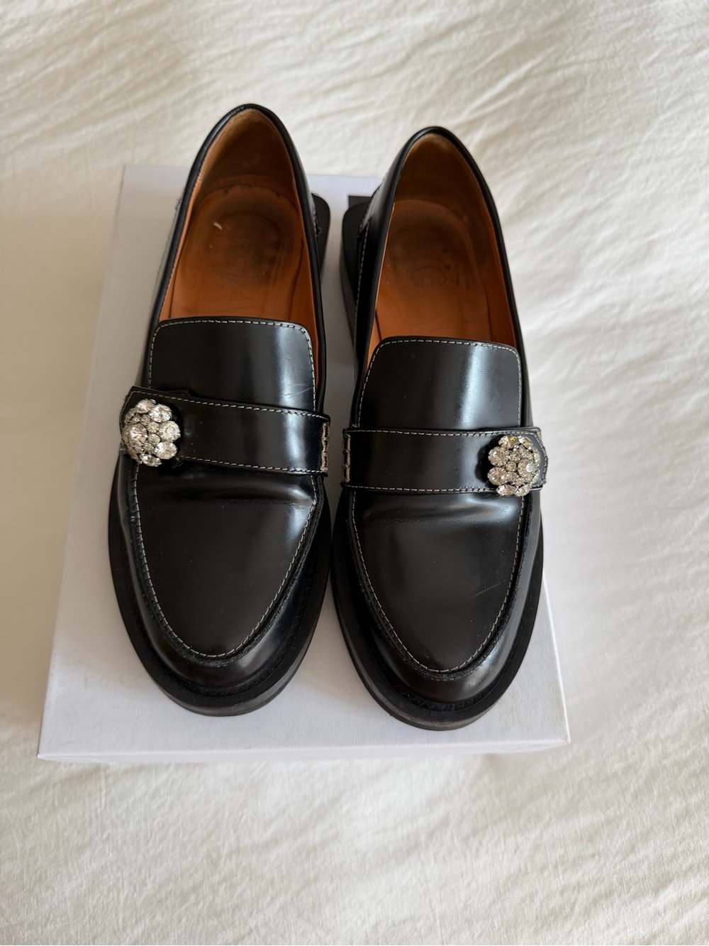 Ganni Black Leather Loafers with Decorative Crystal Buckle
